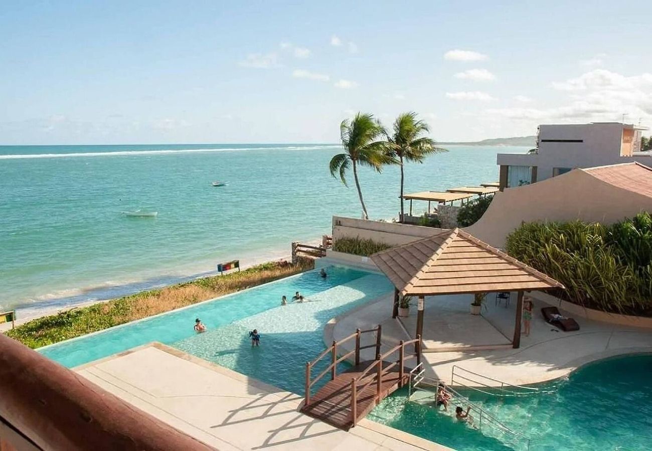 Apartamento en Barra de São Miguel - Barra Bali Pie en la arena con vista al mar 