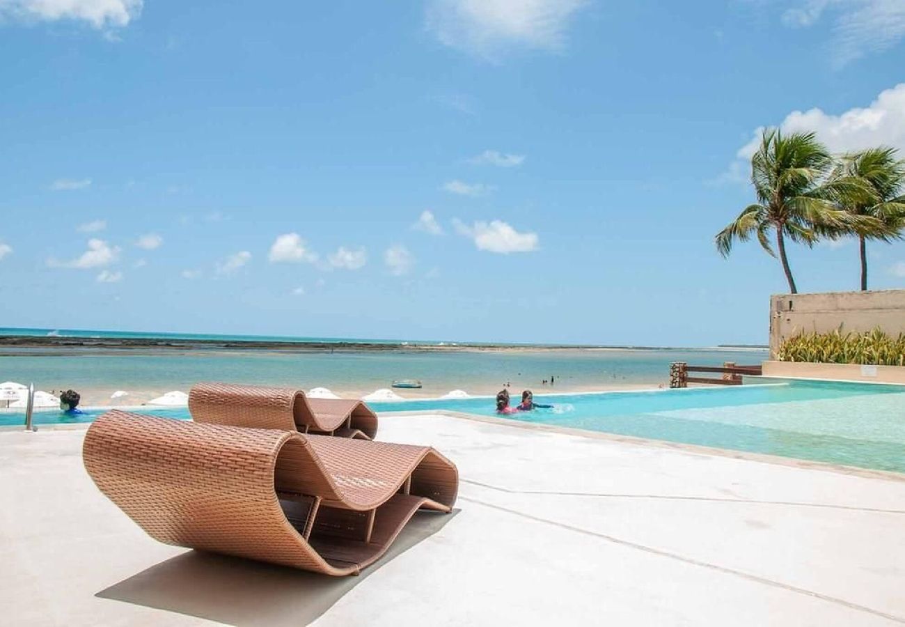 Apartamento en Barra de São Miguel - Barra Bali Pie en la arena con vista al mar 