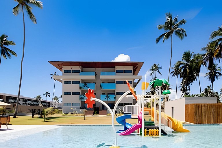 Apartamento a pie de playa en resort con piscina privada por