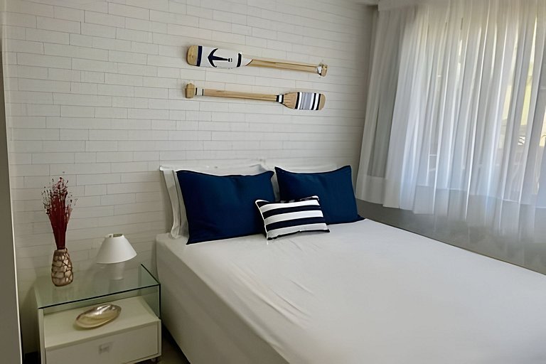 Beachfront Apartment in a Condo with Balcony