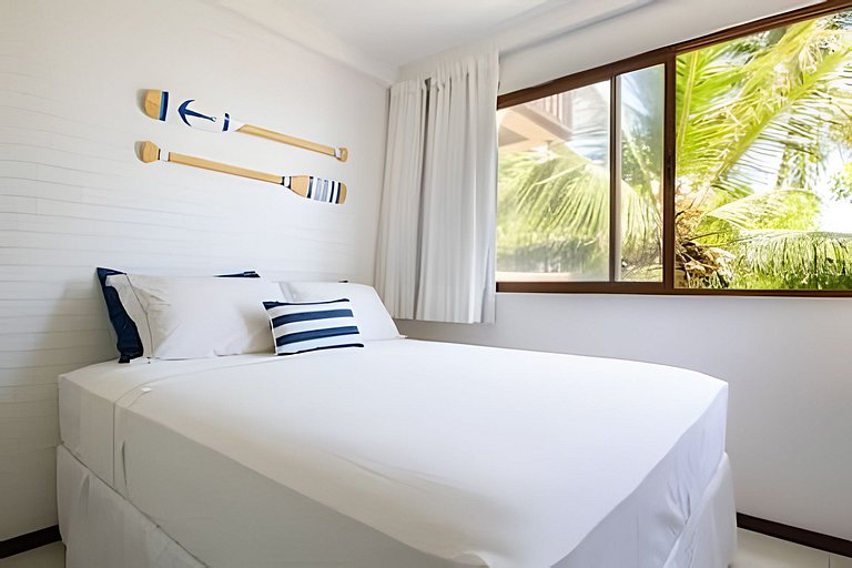 Beachfront Apartment in a Condo with Balcony