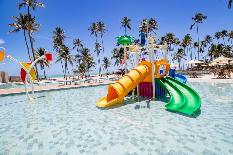 Apartamento a pie de playa en resort con piscina privada por